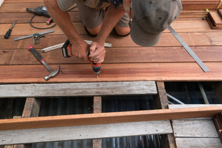 Outdoor deck construction in Maple Grove during summer